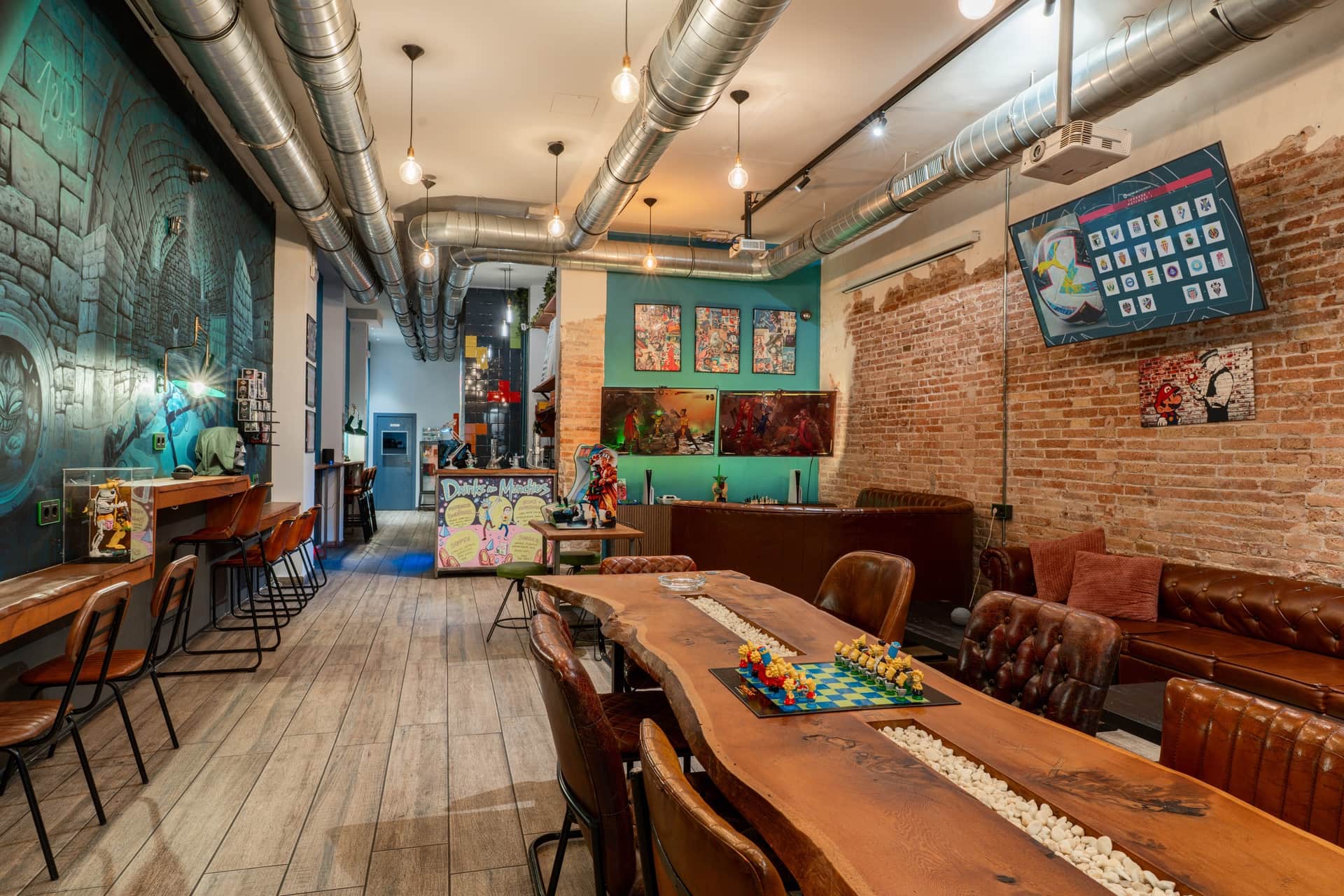 Art wall and board games area in cannabis club 1UP in Barcelona                